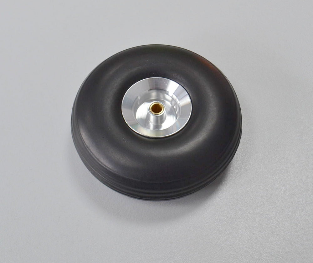 Solid rubber wheel 70mm (FEMA/DUBRO), 24mm wide, with rim and 5.1mm hub bore
